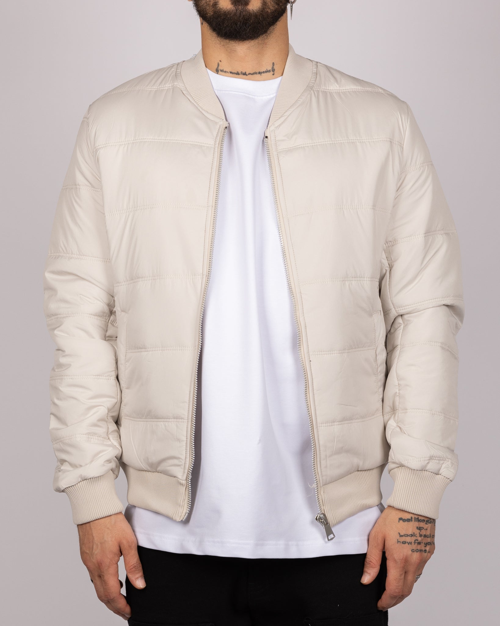 Quilted Bomber Jacket in Beige