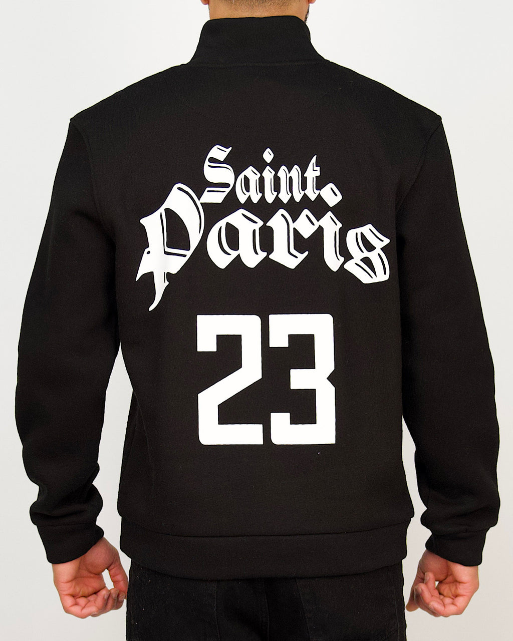 Back view of a men’s regular-fit black varsity-style jacket with a Saint Paris graphic and large “23” print.