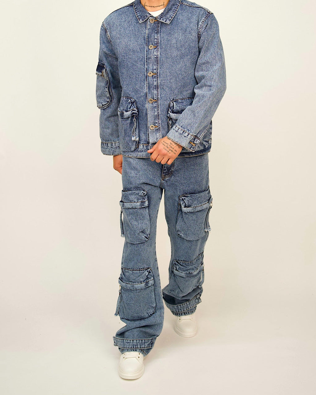 Men’s loose-fit blue denim cargo set with a utility jacket and multi-pocket cargo jeans.