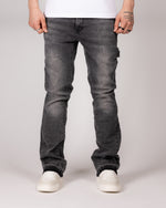 Washed Grey Flared Jeans With Raw Hem And Vintage Fade
