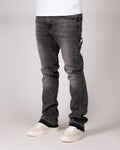 Washed Grey Flared Jeans With Raw Hem And Vintage Fade