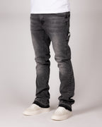 Washed Grey Flared Jeans With Raw Hem And Vintage Fade
