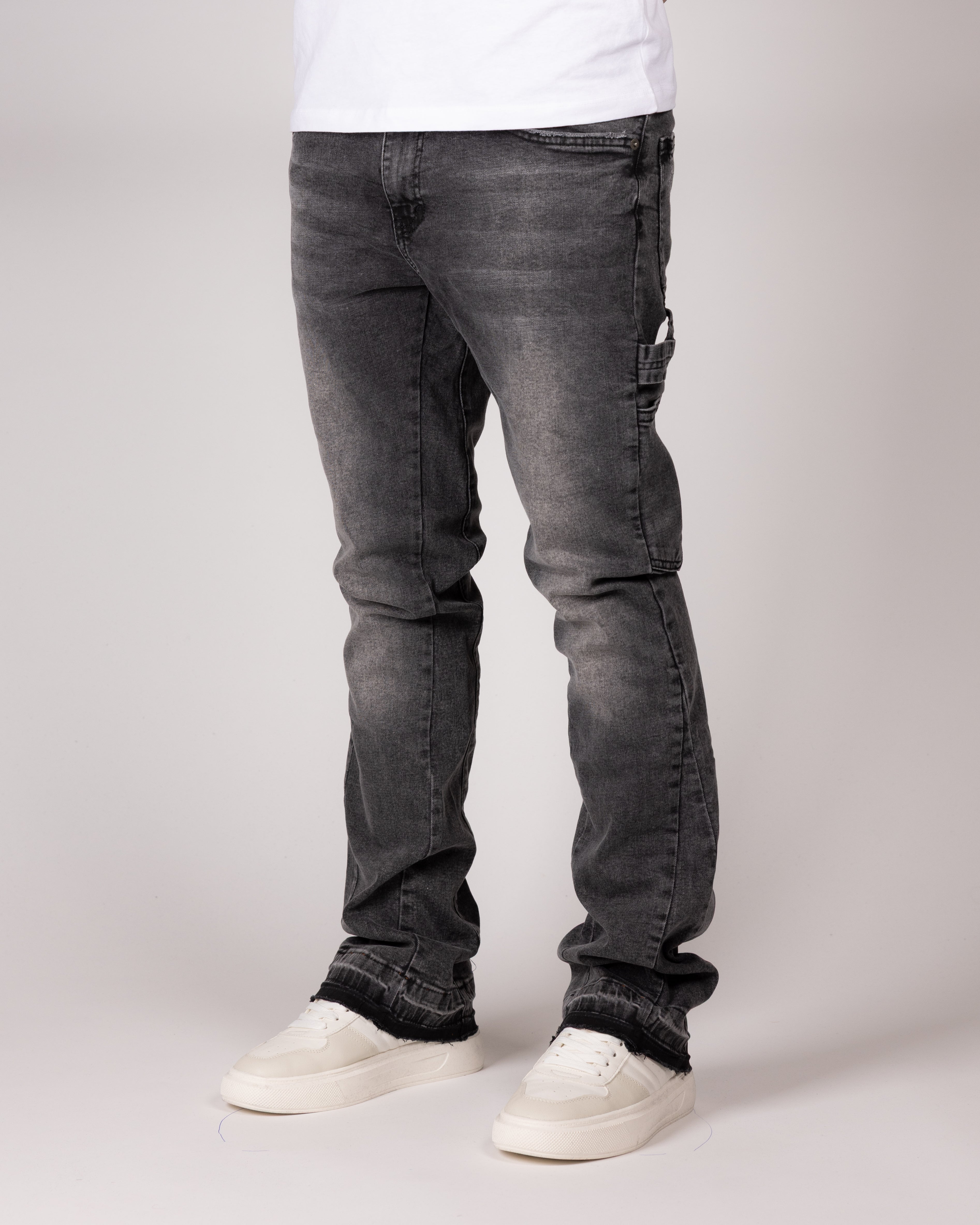 Washed Grey Flared Jeans With Raw Hem And Vintage Fade