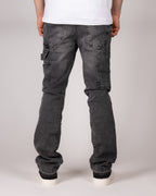 Washed Grey Flared Jeans With Raw Hem And Vintage Fade