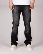 Washed Black Flared Jeans With Distressed Details