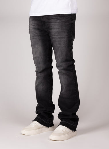 Washed Black Flared Jeans With Distressed Details