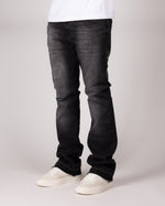 Washed Black Flared Jeans With Distressed Details