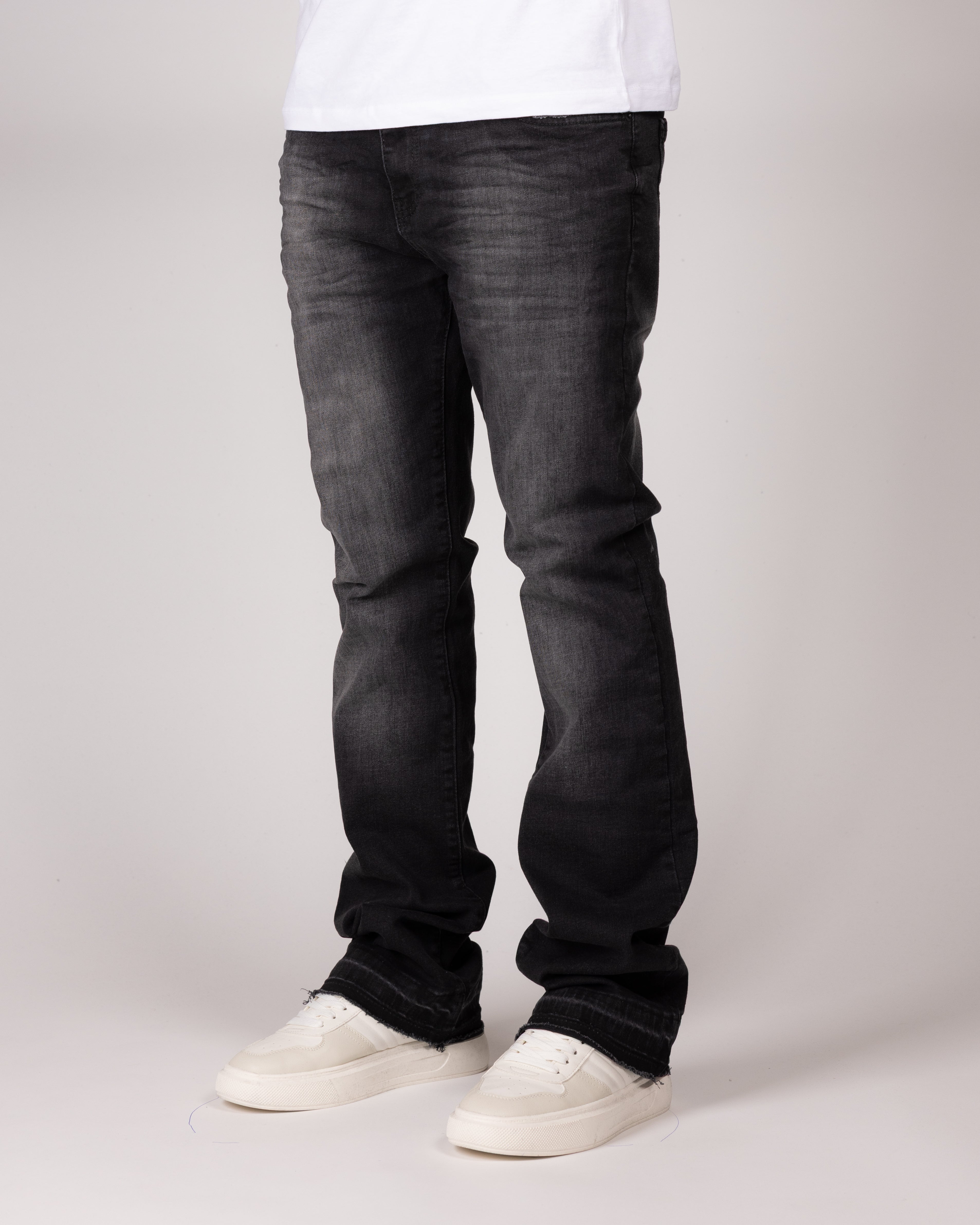 Washed Black Flared Jeans With Distressed Details