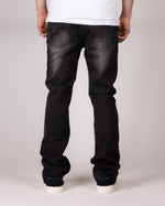 Washed Black Flared Jeans With Distressed Details