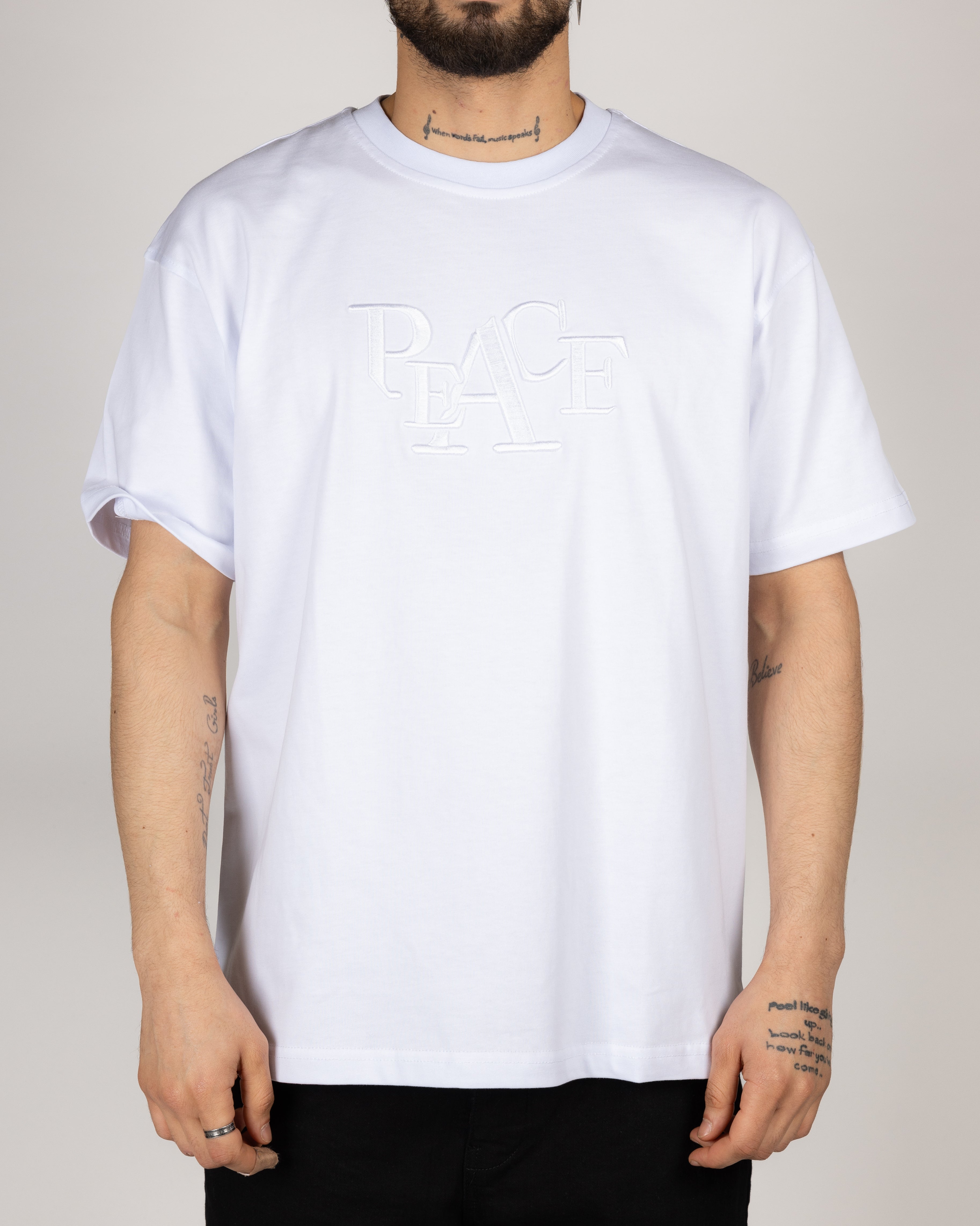Oversized Embossed "PEACE" T-shirt