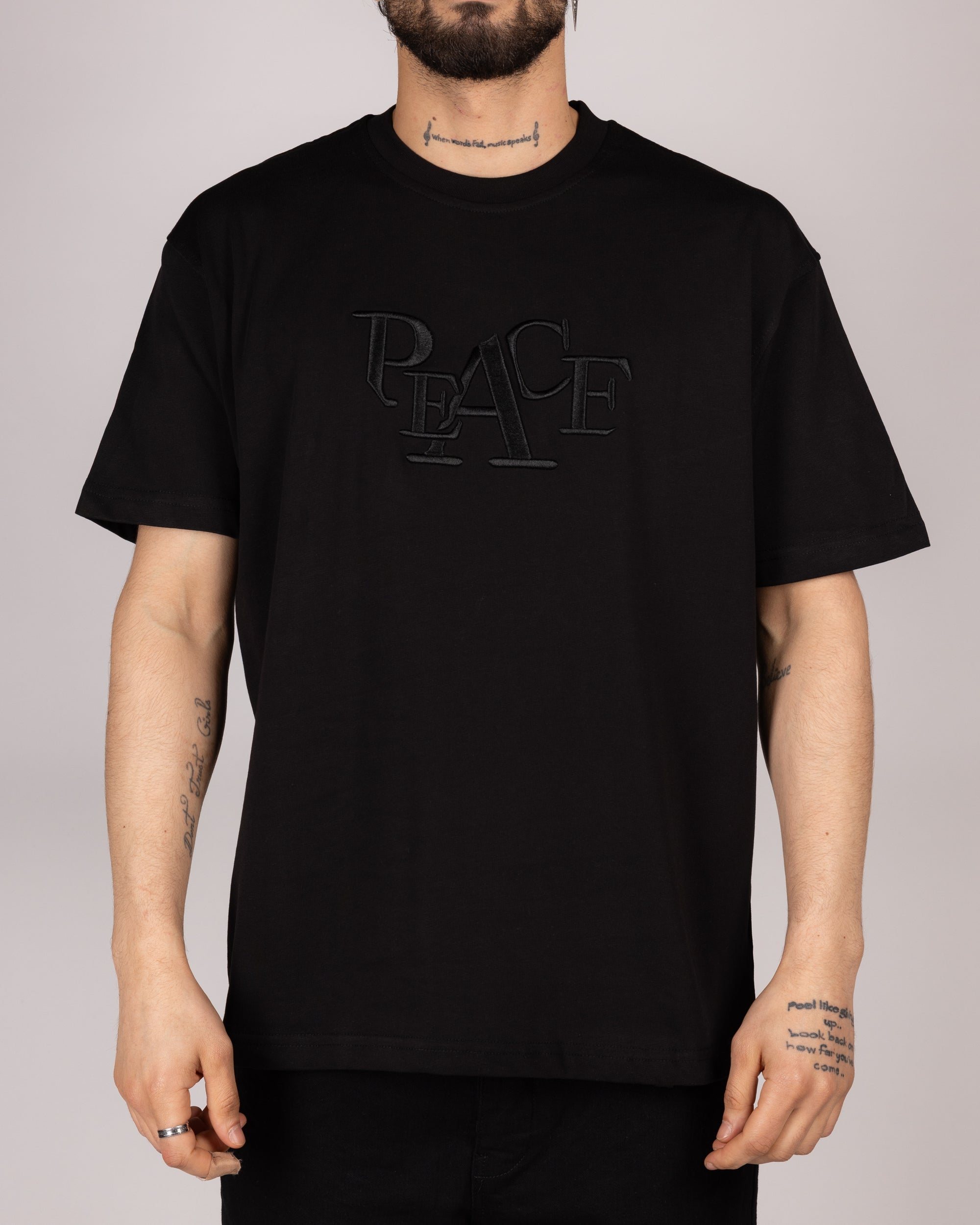Oversized Embossed "PEACE" T-shirt