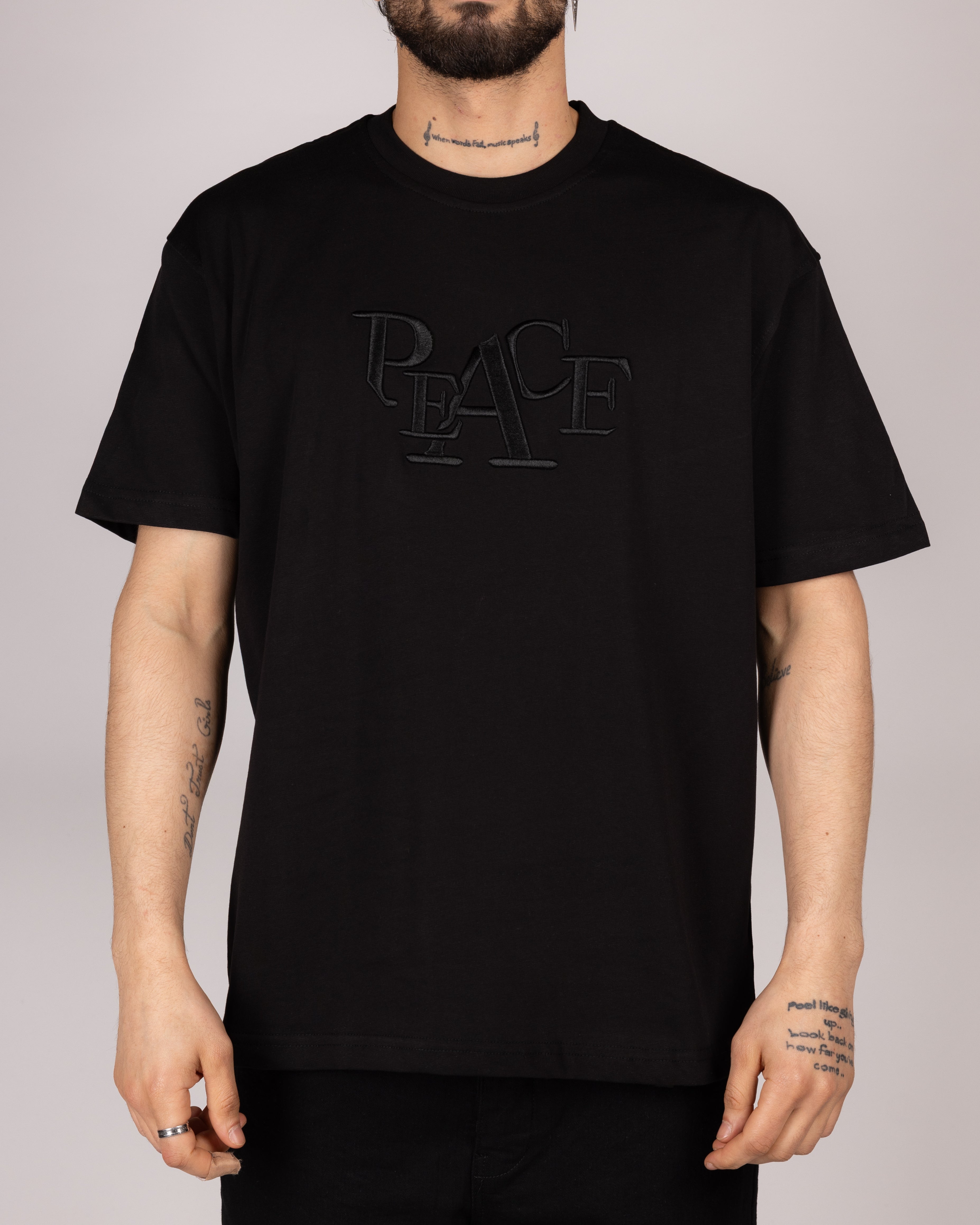 Oversized Embossed "PEACE" T-shirt