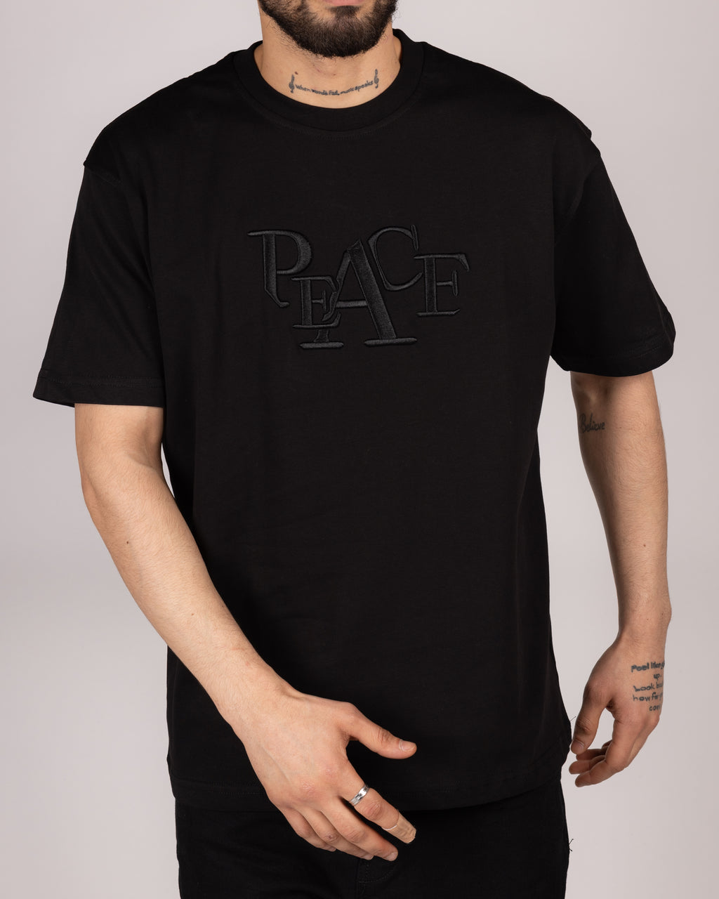 Oversized Embossed "PEACE" T-shirt