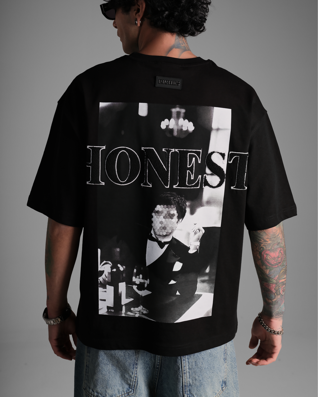 Men's Riches Oversized Montana Graphic T Shirt in Black featuring a large monochrome Montana graphic print on the back with an oversized fit.