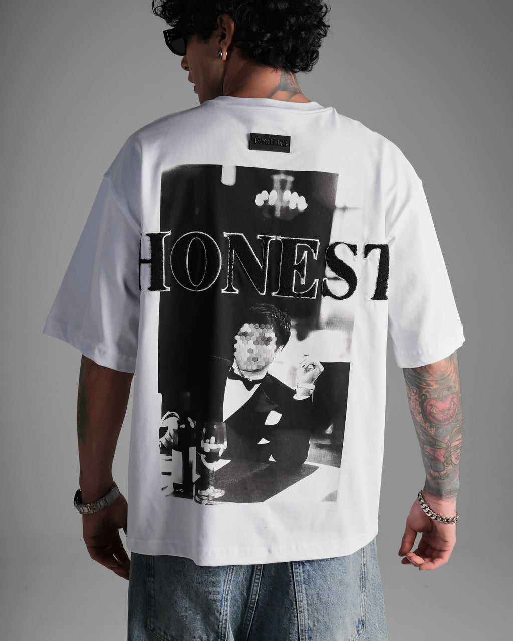 Men's Riches Oversized Montana Graphic T Shirt in White featuring a large monochrome Montana graphic print on the back with an oversized fit.